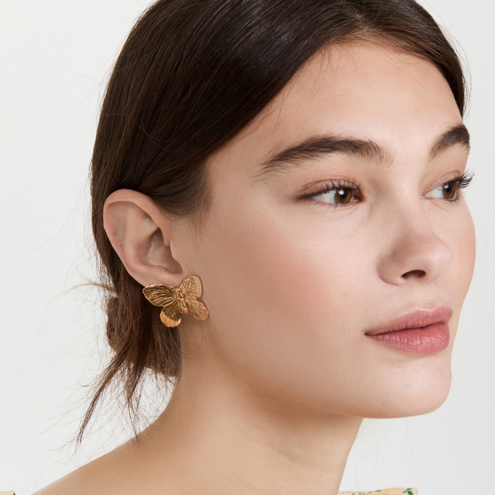 Etched butterfly design
18k gold plated brass
Post closure
